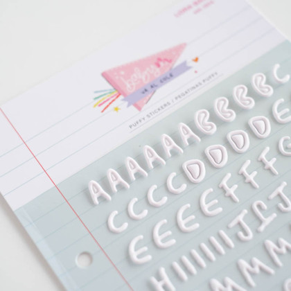 White alphabet Baby M goes to school